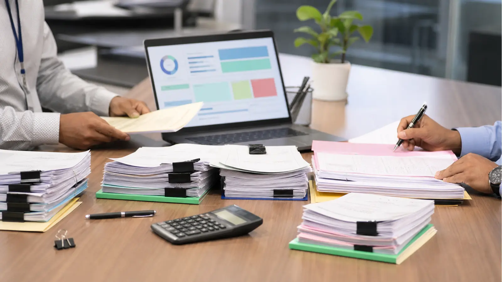RTA operations desk with organized record stacks for issuer approvals, depository balances, physical folios and certification evidence