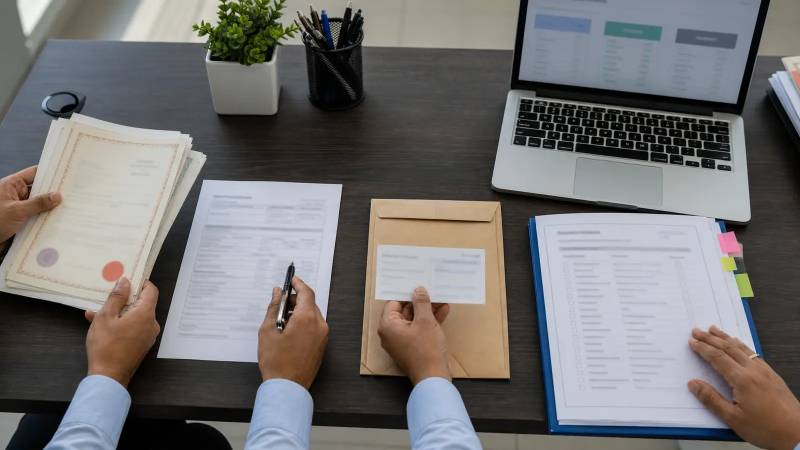 Physical certificates, DRF packet and RTA confirmation workflow arranged on a corporate operations desk